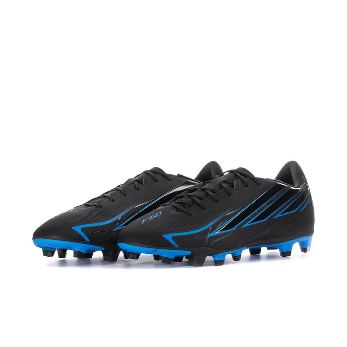 Men's black and blue firm-ground soccer cleats, side view, lace-up