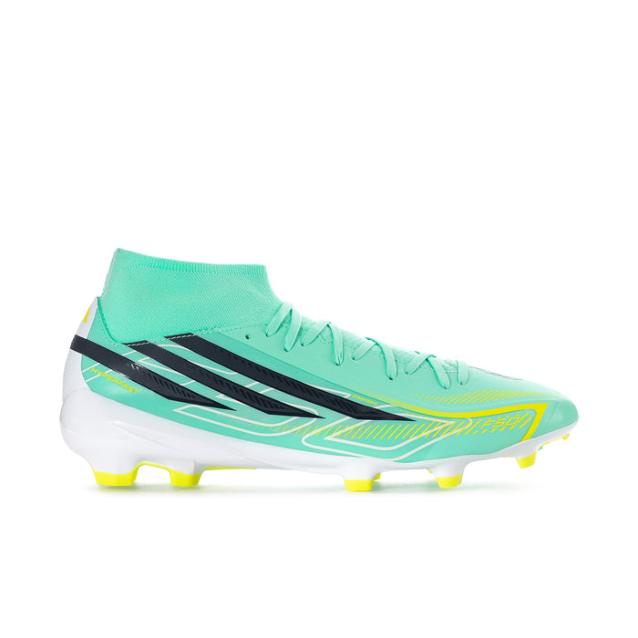 Men's mid-cut soccer cleats in mint with black stripes and yellow studs