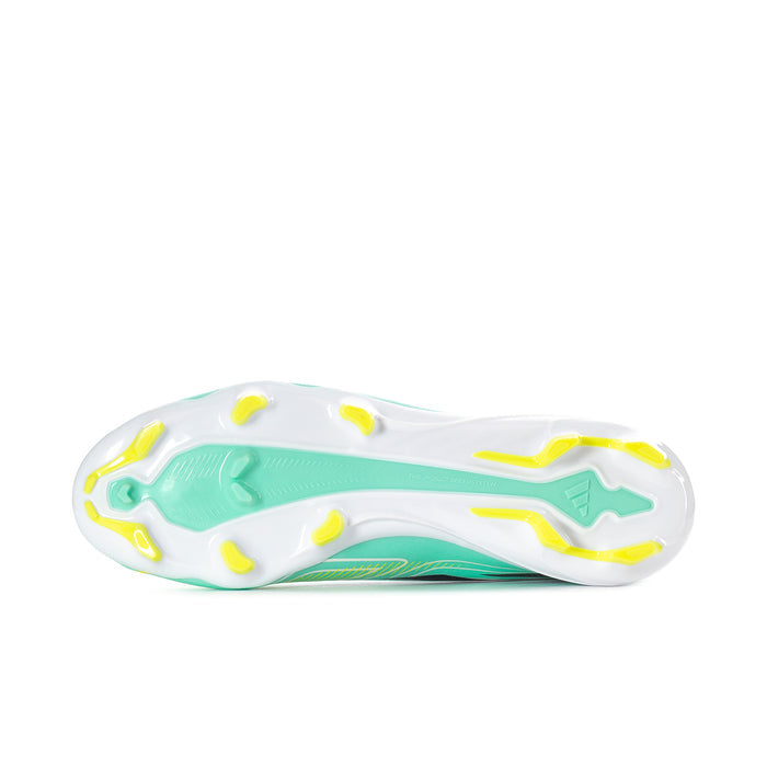 Mint soccer cleat outsole with molded studs, white base, and lime channel accents
