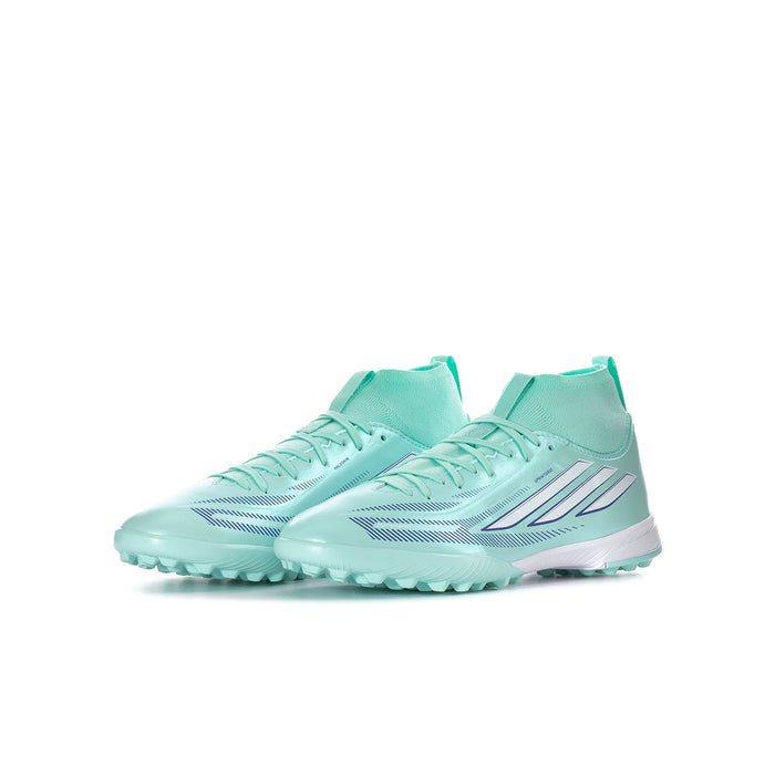 Youth soccer cleats, mint and white, side view with lace-up and traction studs