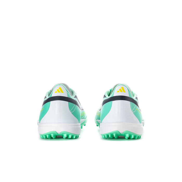 Back view of mint soccer turf cleats with white heel panel and black stripe