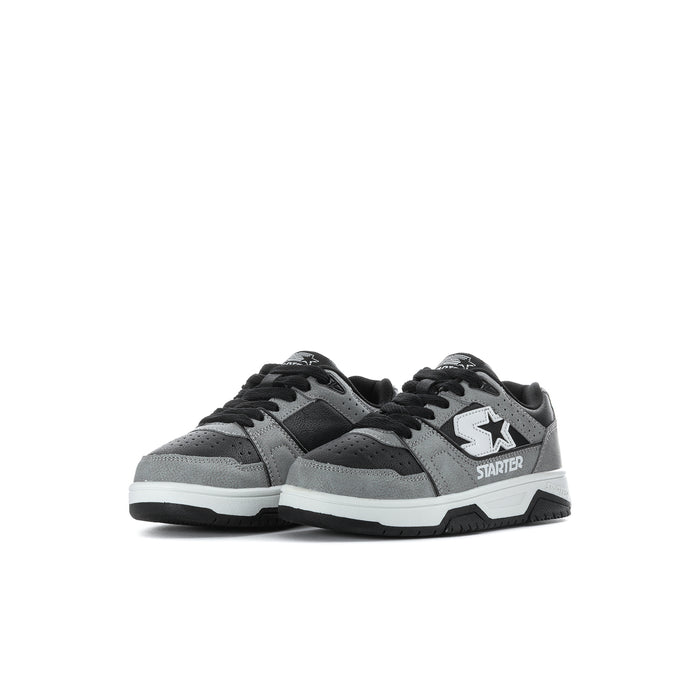 Kids pair of low-top sneakers, black and gray with white midsoles and star badges