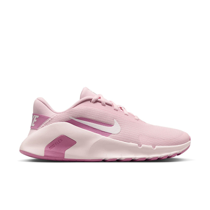Women’s pink and white training sneaker, lace-up mesh upper with Nike Swoosh.
