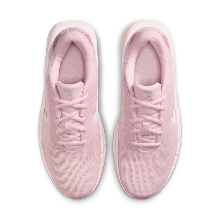 Women’s pink training shoes, lace-up design and mesh texture, front view.