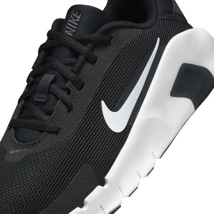 Women's black training shoe close-up, Nike swoosh and NIKE FLEX marking