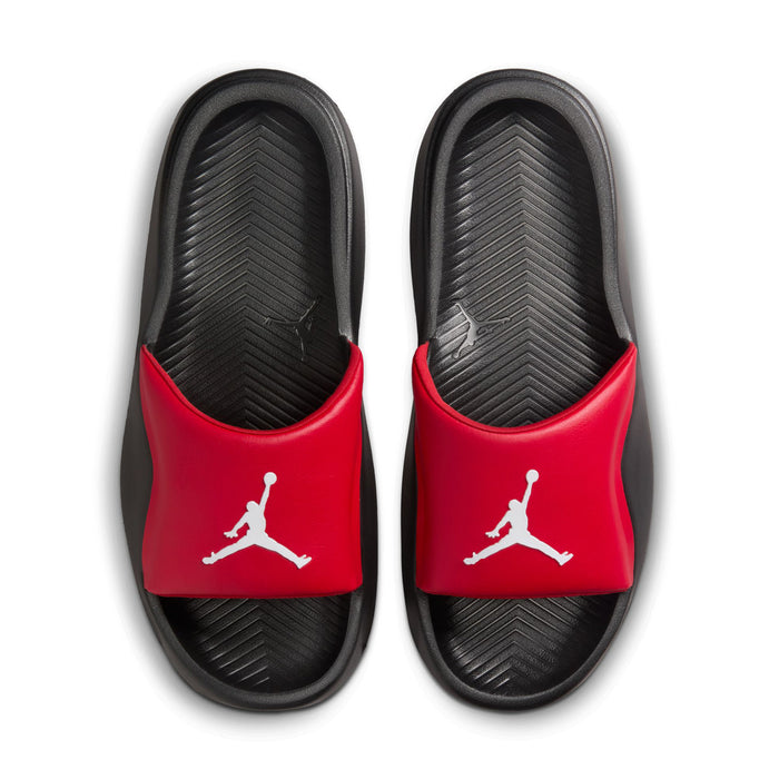 Men's slide sandals pair, red uppers with white Jumpman logos on black footbeds