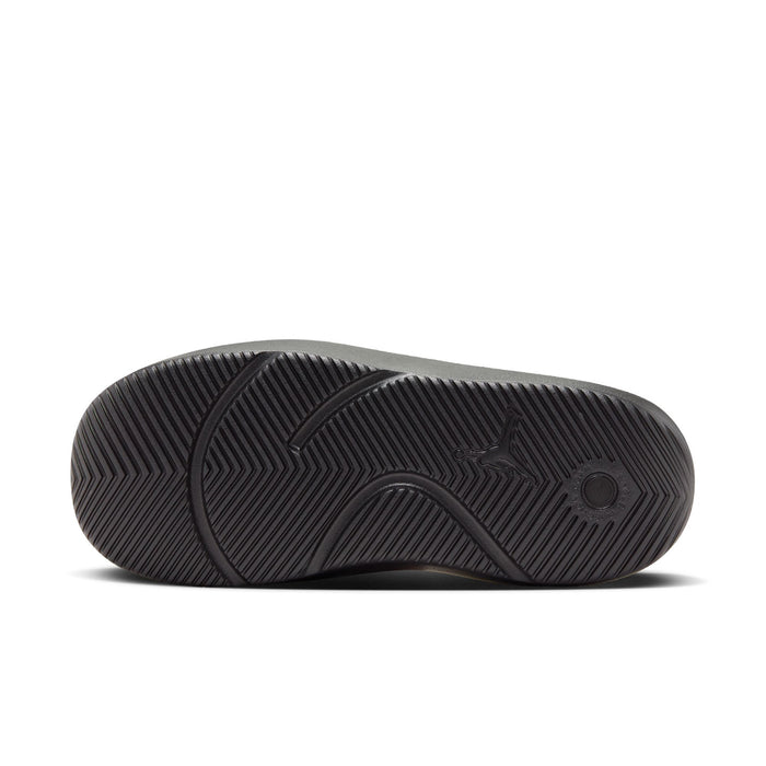 Men's slide sandal outsole, textured black rubber tread with circular grip