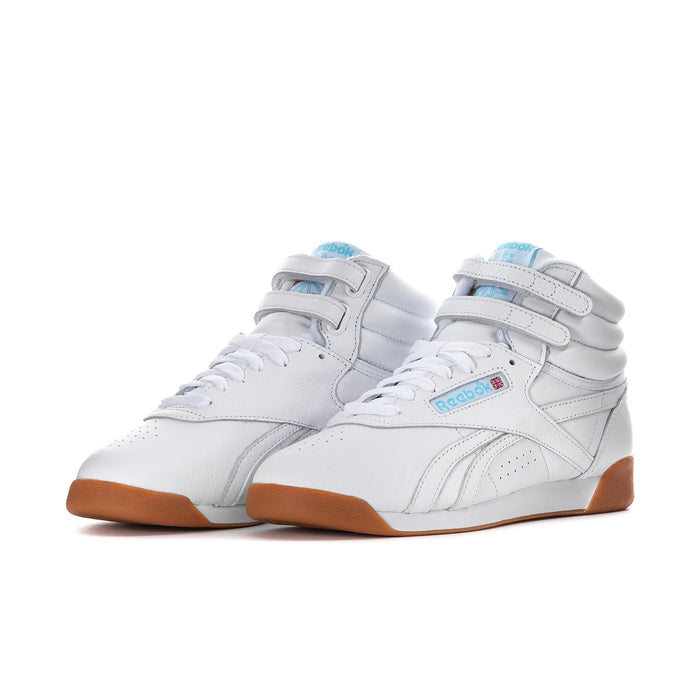 White high-top sneakers with blue accents, lace-up, gum outsole