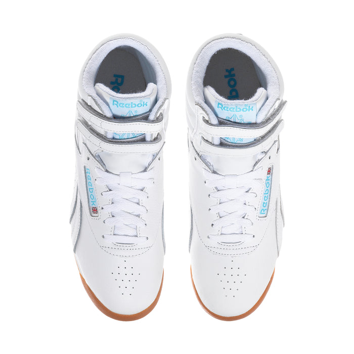 White high-top sneakers, lace-up front with blue-lined tongue, gum sole