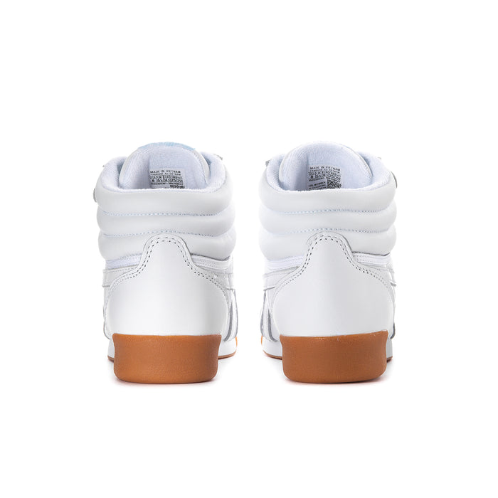 White high-top sneakers with padded collar and gum heel trim