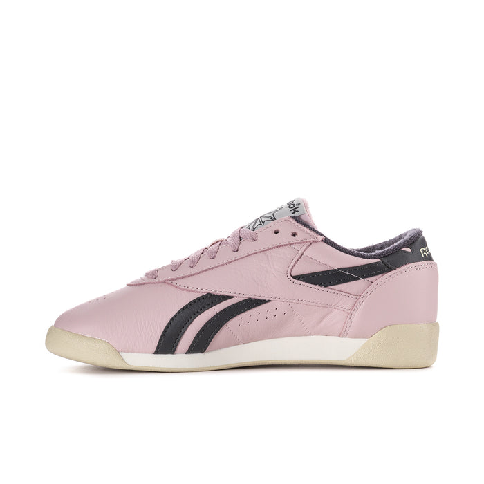 Women's pink low-top sneakers with black stripes and lace-up closure