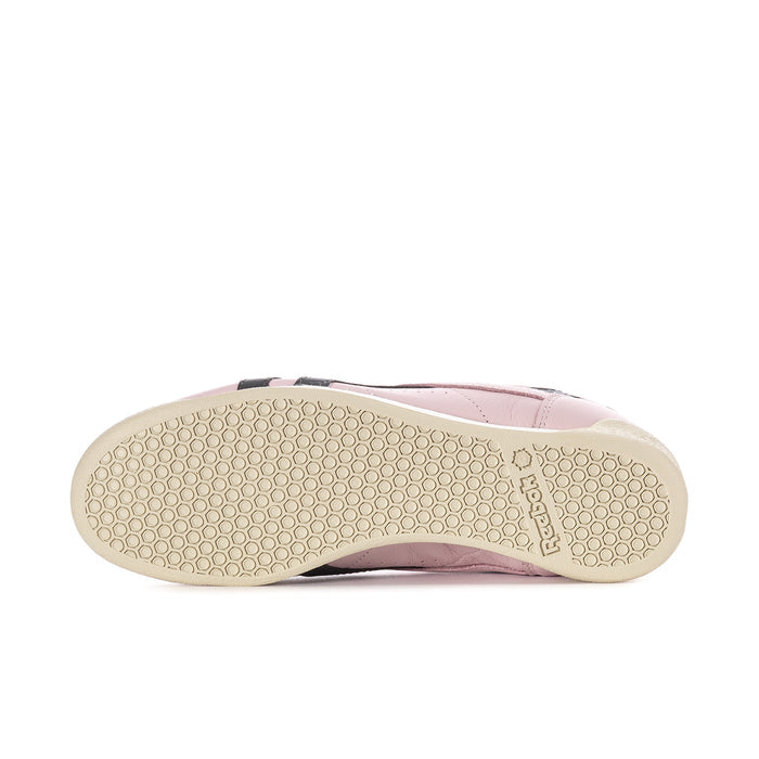 Women's low-top sneaker outsole, cream rubber tread under pink upper
