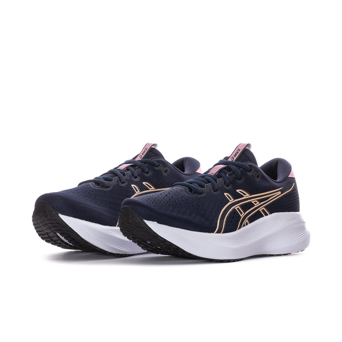 Women's navy running shoes, side view, with gold stripe detailing and white midsole