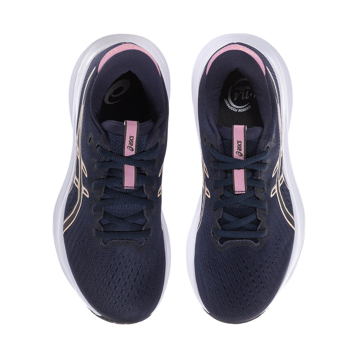 Women's navy lace-up shoes with pink pull tab and gold stripe accents inside