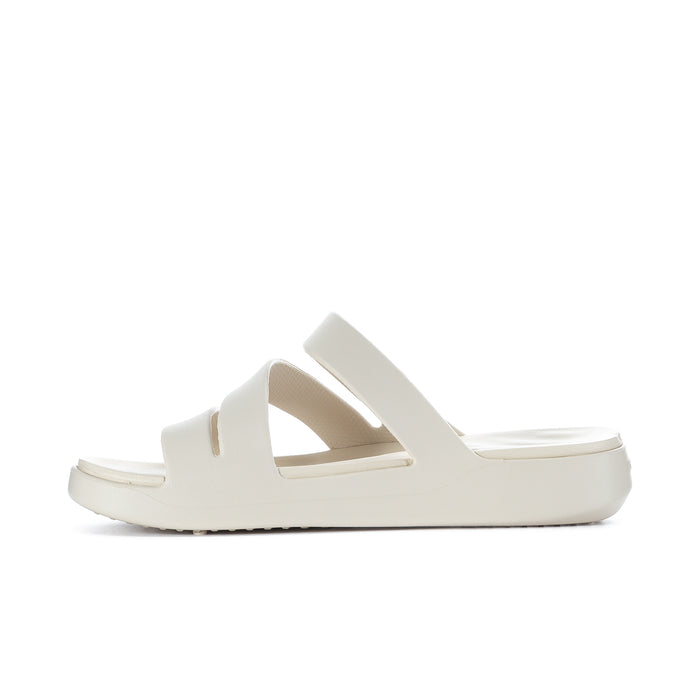 Women’s light beige strappy slide sandal shown from the side