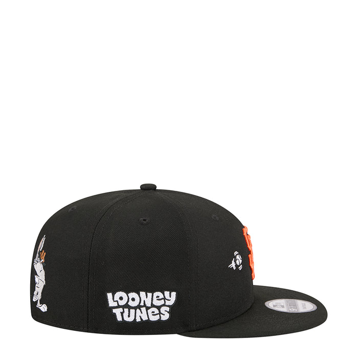 Black cap with Looney Tunes text, curved brim, and side character graphic