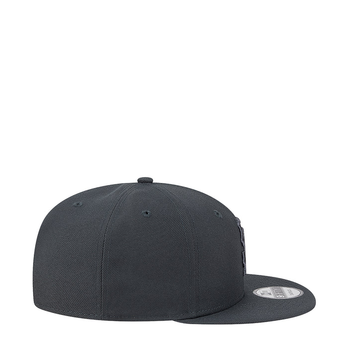 Dark gray baseball cap with curved brim and stitched panels, adjustable closure at back
