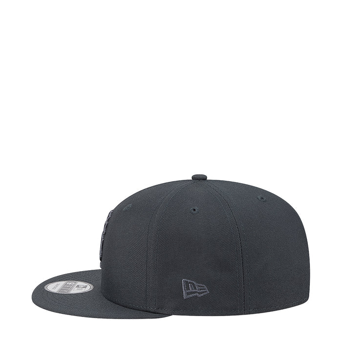 Dark gray baseball cap with New Era logo on front panel and flat side patch