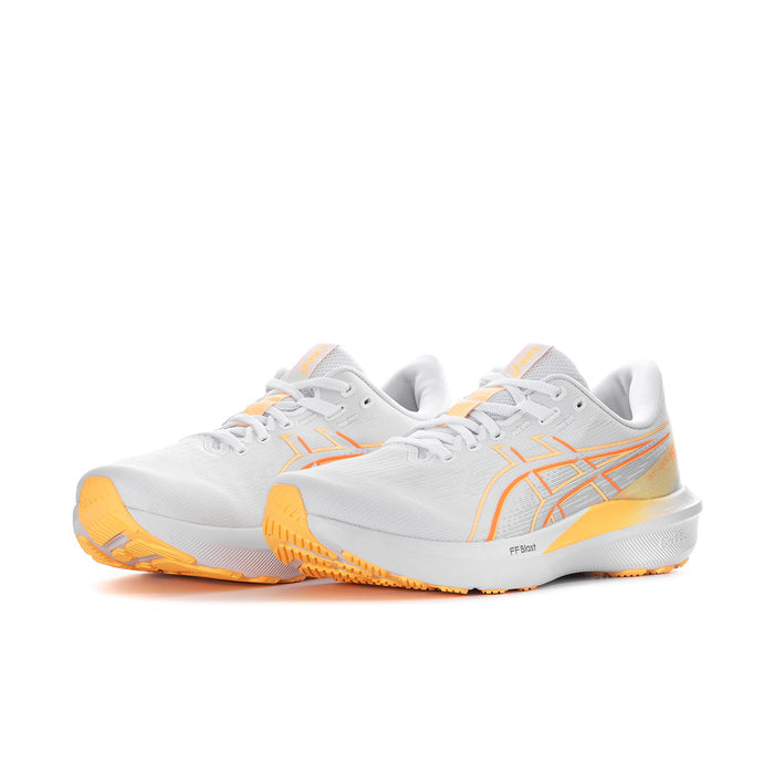 Women’s running sneakers, white upper with coral-orange side stripes and grippy outsole