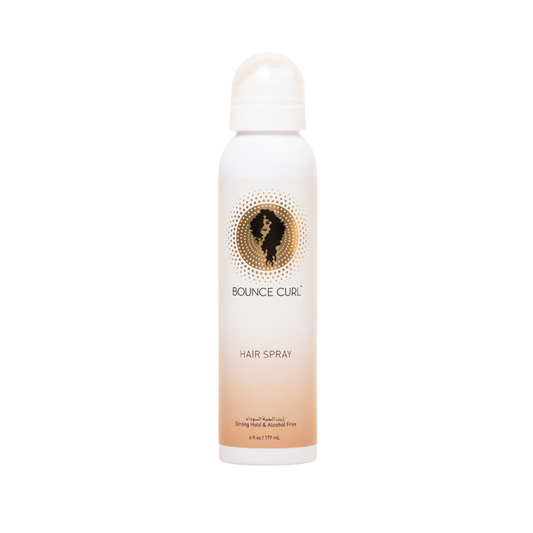 Bounce Curl hairspray bottle with ombre bottle and golden Bounce Curl logo