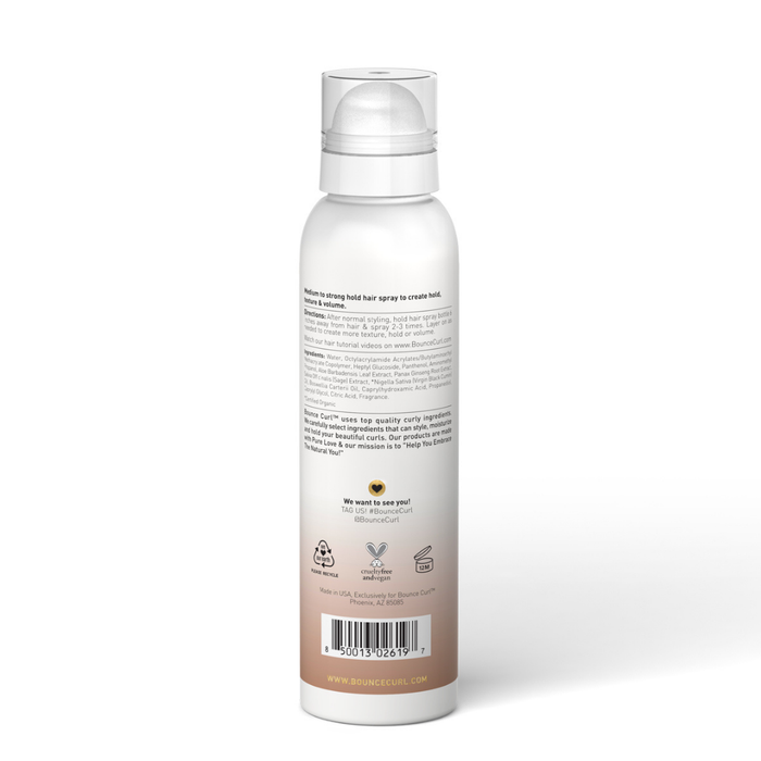 Bounce Curl hair product in a clear bottle with white cap on a cream background.