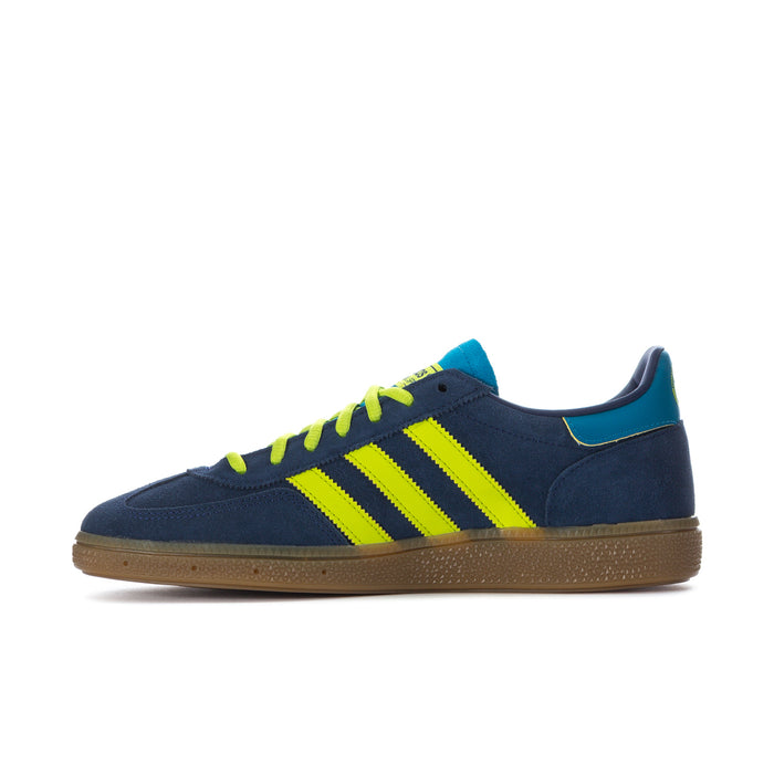 Men's low-top sneakers in navy blue with neon green stripes and teal side panel