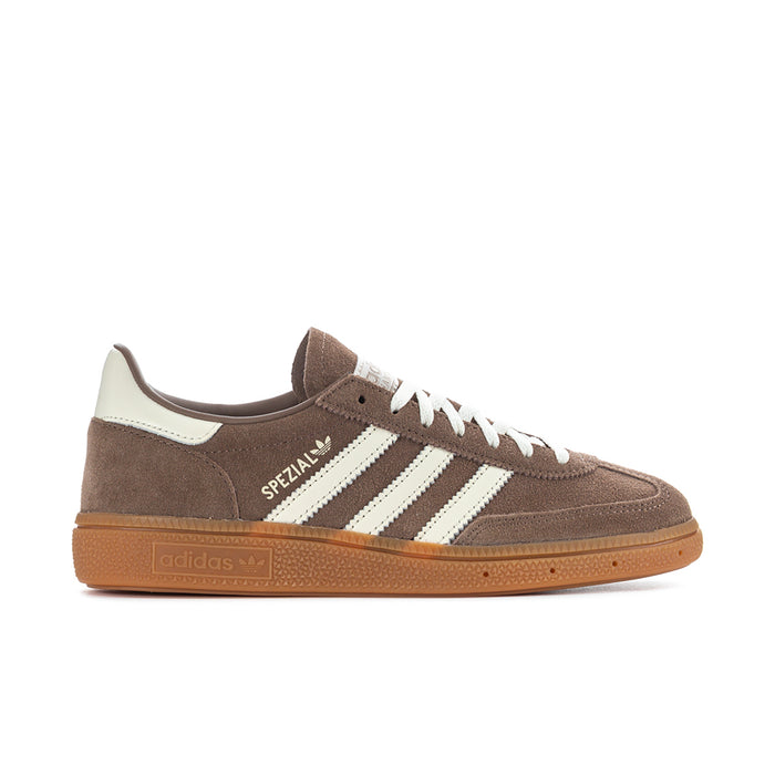 Brown suede women’s sneakers with white stripes and gum sole