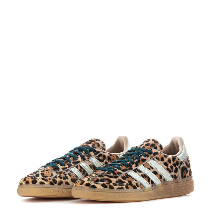 Women's adidas leopard-print sneaker, angled view with white stripes and teal lace trim