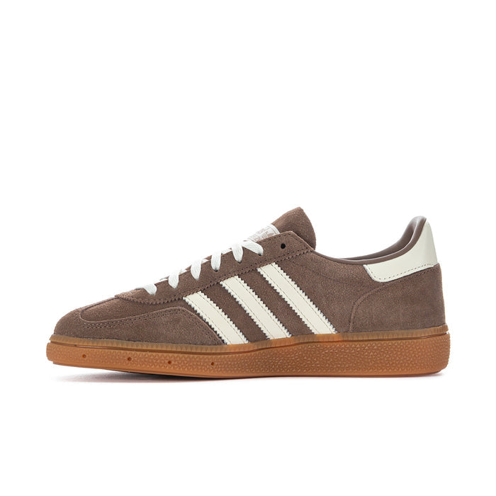 Brown suede low-profile sneakers with white stripes and lace-up front
