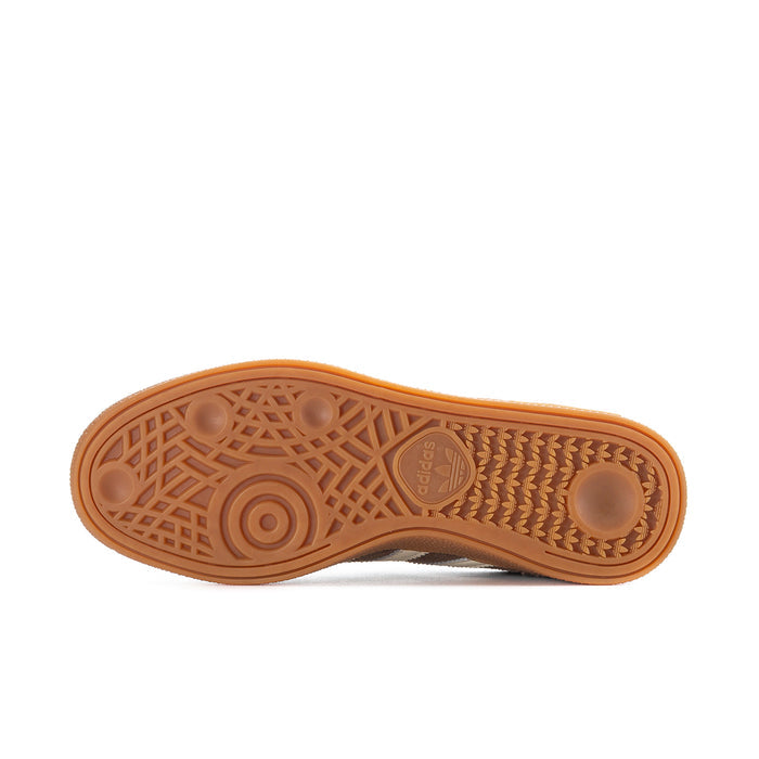 Gum rubber outsole with textured tread pattern for grip