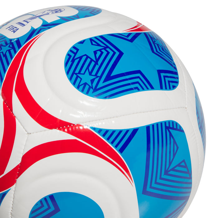 Host Nations Americana Club ball close-up, blue star shapes and red curved stripes on white