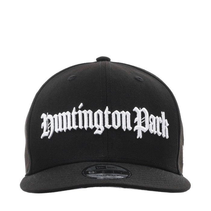 Black baseball cap with white Huntington Park script logo on the front panel