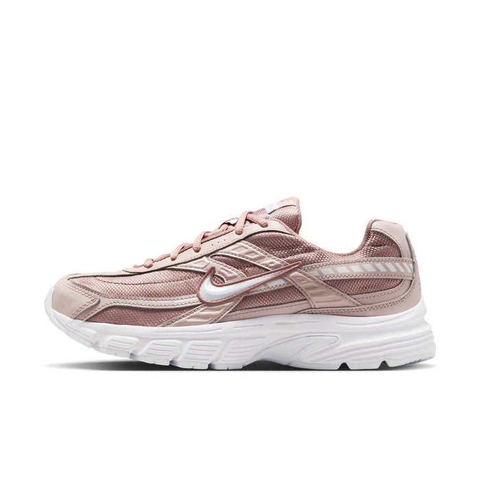 Women's dusty pink lace-up sneakers, angled side view, white chunky sole