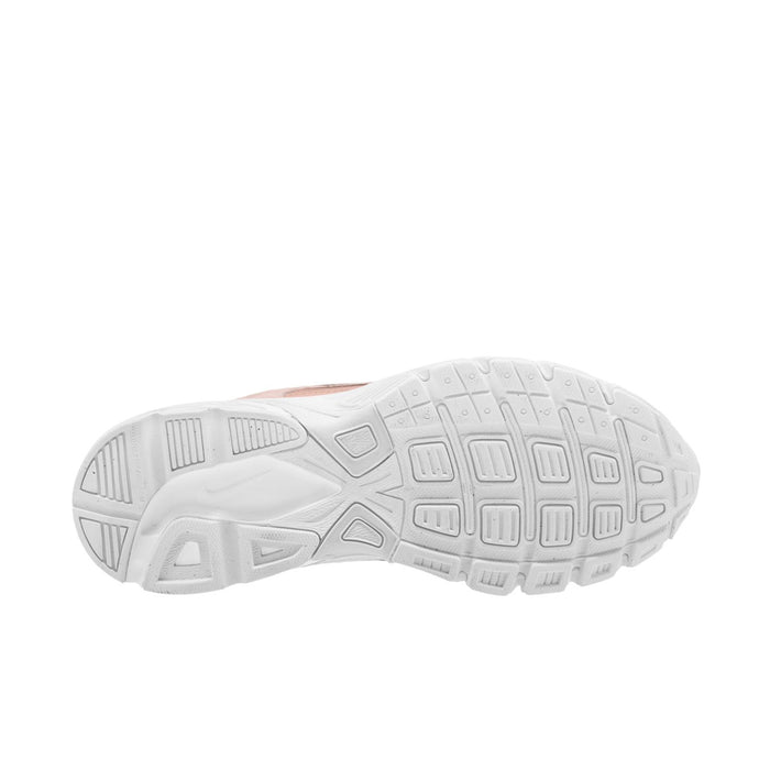 Outsole view: white rubber traction tread under dusty pink sneakers