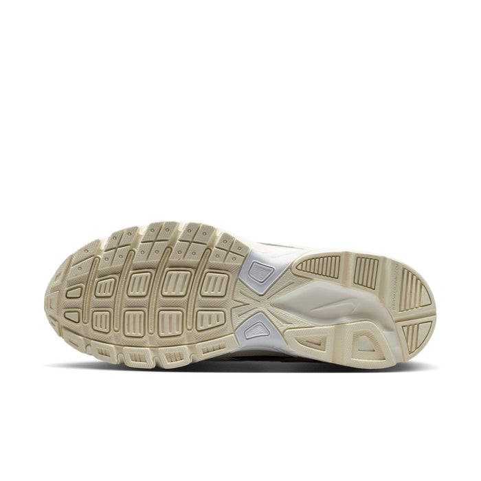 Women's sneaker outsole with textured rubber tread in cream and tan