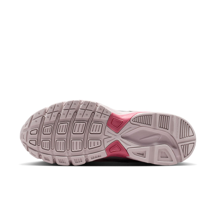 Outsole view of light gray and pink women's sneaker with traction tread