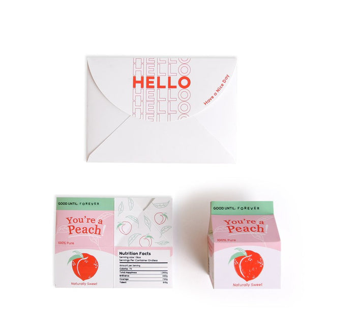 Juice box pop-up greeting card, white with 'HELLO' and peach juice box insert