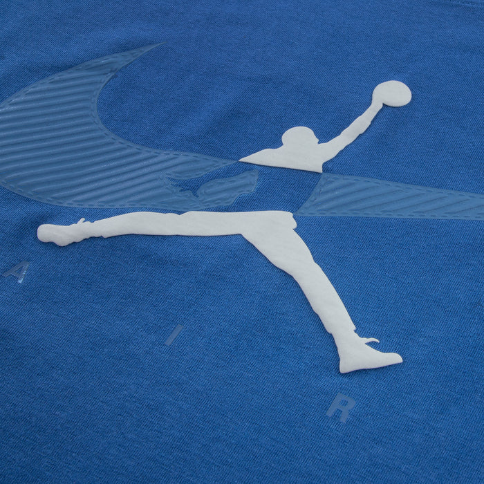 Youth blue T-shirt close-up: large Jumpman silhouette logo on chest