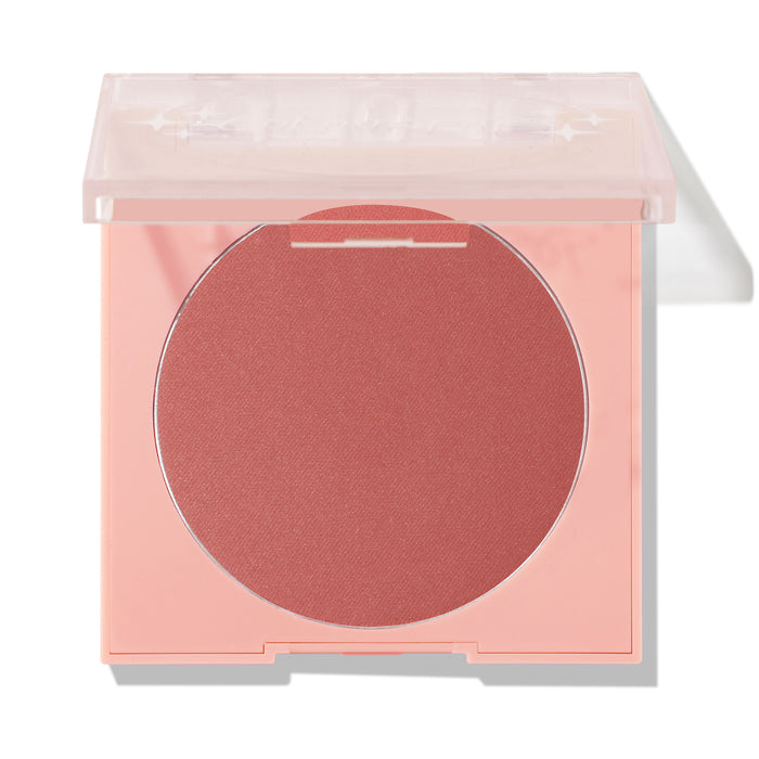 ColourPop Pressed Powder Blush in Just Cruisin' opens to reveal a large matte rose pan in a peach square compact with a clear lid half-closed, shown in a clean studio shot on white.