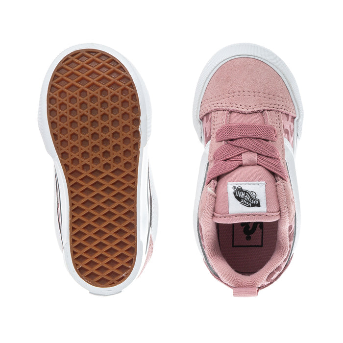 Toddler sneakers shown with brown textured outsole and pink suede top with laces