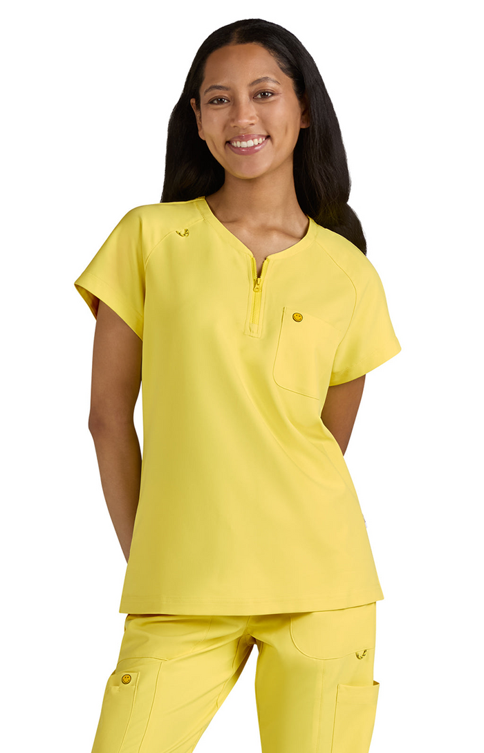 koi™ Women's Smiley World Ecstatic Pocket Top