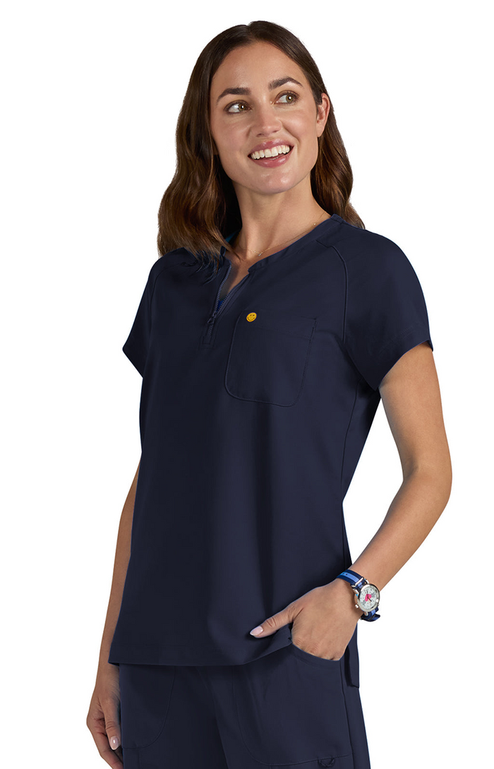 koi™ Women's Smiley World Ecstatic Pocket Top