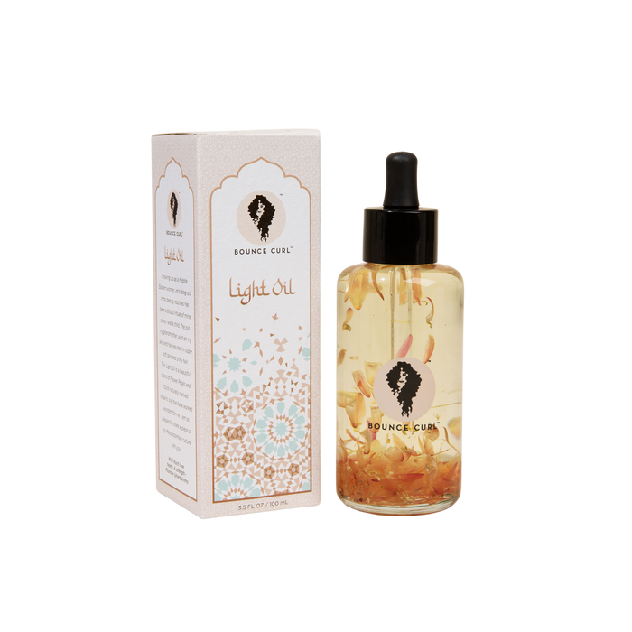 Bounce Curl versatile use light oil product and its packaging.
