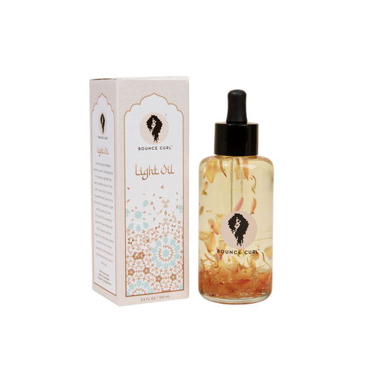Bounce Curl versatile use light oil product and its packaging.