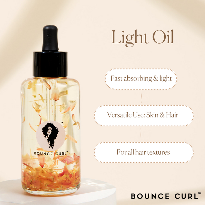 Bounce Curl Light Oil for all hair textures. Fast absorbing versatile use for skin and hair.
