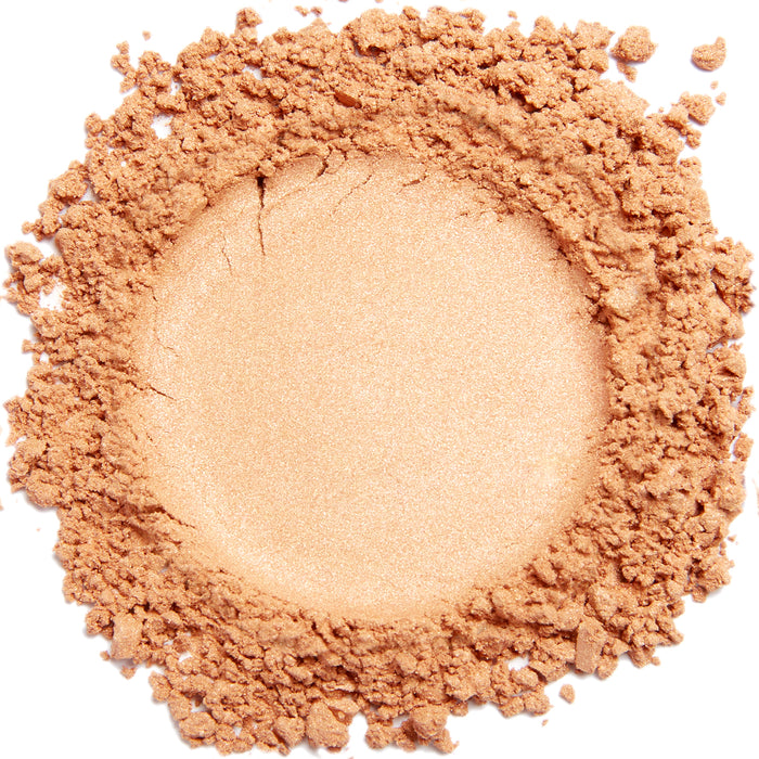 A swatch of Limited Edition #9 Peach mineral eye color, showing a matte finish peachy eyeshadow.