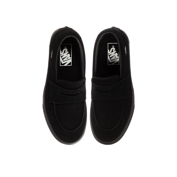 Kids' black Vans loafer, inside view showing Vans logo and slip-on opening
