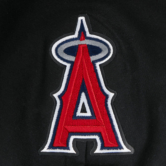 Embroidered team A logo patch on black fabric with white outline and red center
