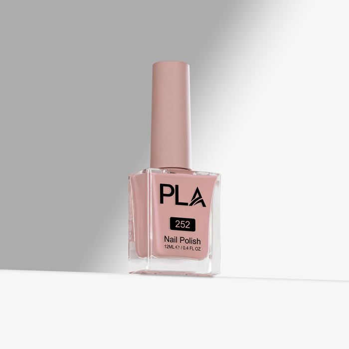 Pink nail polish bottle with 'PLA' branding on a gray background