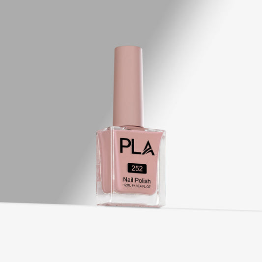 Pink nail polish bottle with 'PLA' branding on a gray background